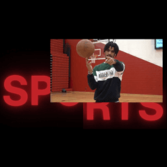 Sports desk host in front of the word sports glowing red